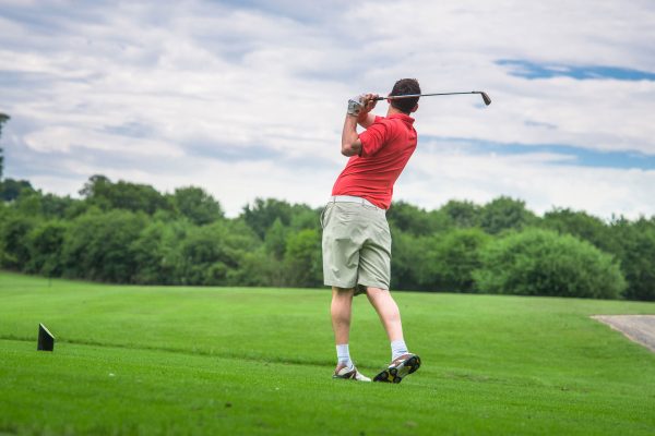 Golfer tee shot